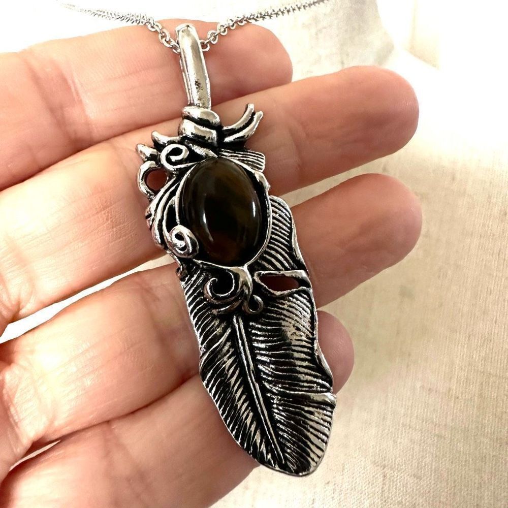Silver tone feather tigers eye pendant necklace